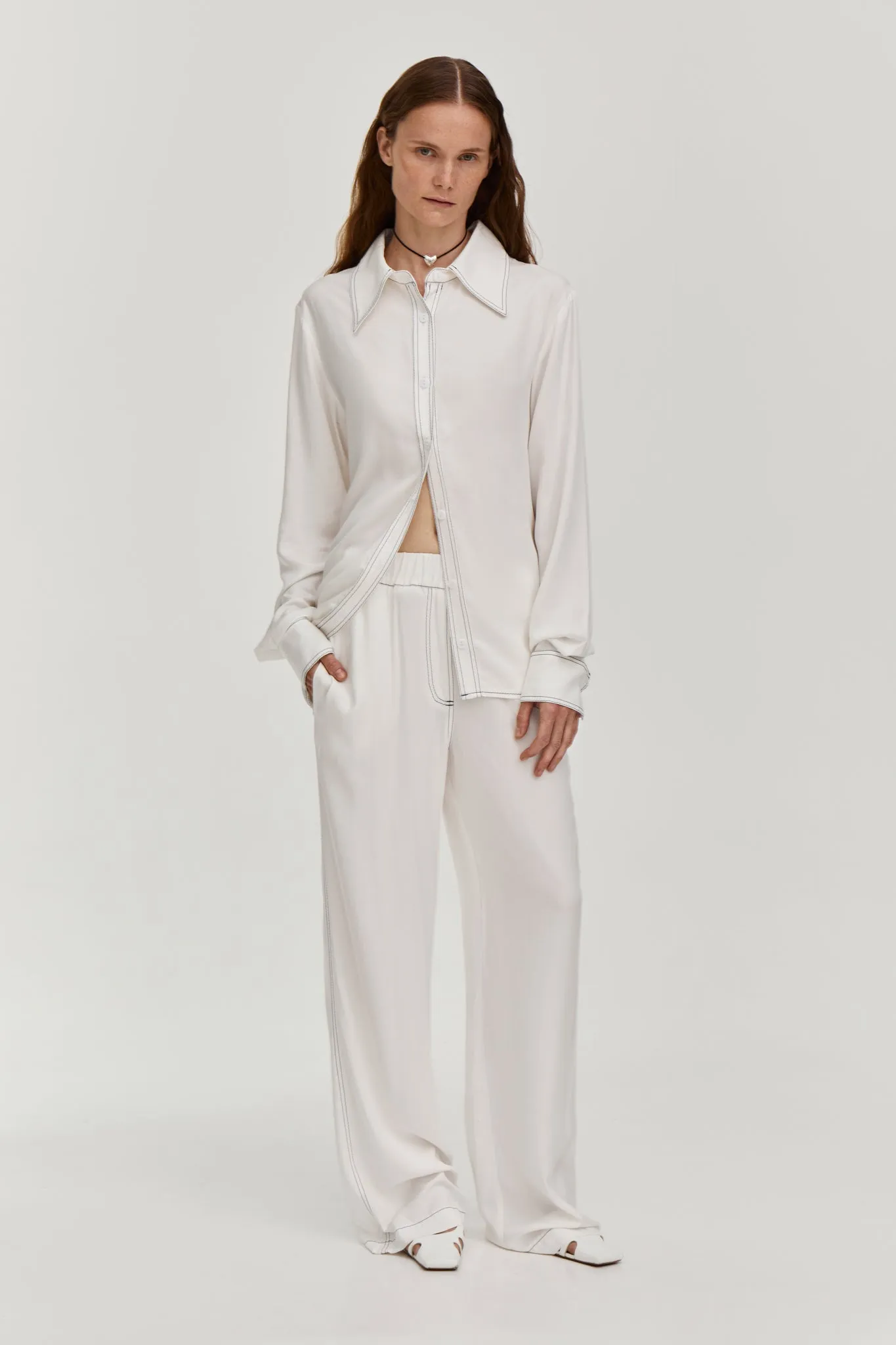 Contrast stitching trousers - White